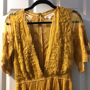 Beautiful mustard high low romper